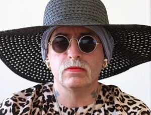 German neo-Nazi fugitive seeks to change gender back to male while on the run