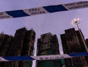 Hong Kong authorities say netting on buildings that caught fire did not meet code