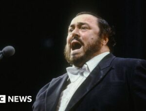 Italian town freezes Pavarotti statue knee-deep in Christmas ice rink, angering widow