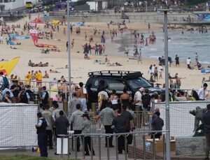 Two gunmen threw homemade bombs that failed to detonate at crowd celebrating Hanukkah in Sydney