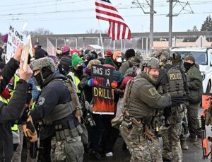 Angry protests erupt in Minneapolis after ICE agent fatally shoots woman driver