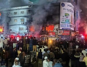 Death toll in Karachi shopping plaza fire rises to 11 as search continues for 60 missing