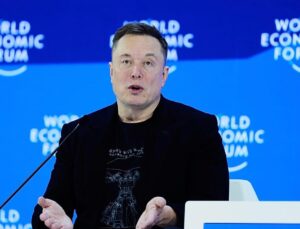 Elon Musk predicts robot-majority future in first Davos appearance