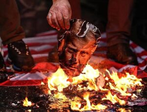 Iran’s foreign minister issues most direct threat yet to US as protester death toll rises