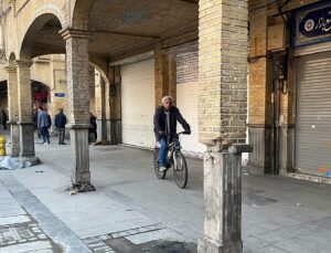 Security forces clash with protesters in Iran’s main bazaar as 36 killed in rallies