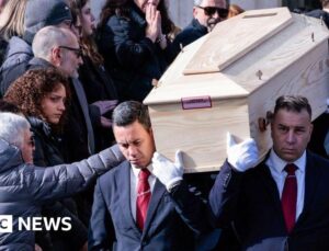 Swiss search souls and question government after ski resort fire