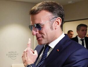 Trump mocks Macron’s aviators in Davos address amid growing war of words