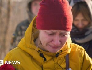 Fearing Russia will seize her town, war widow moves husband’s grave to Kyiv