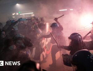 Italian police arrest protesters after clash in Olympic host city Milan