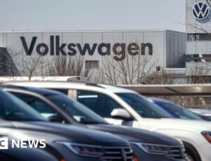 Volkswagen to cut 50,000 jobs as profits drop