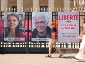 Iran allows two French former detainees to leave the country, Macron says