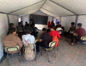 Gaza students sit exams in tents as nearly all schools lie in ruins