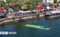 Trainee driver crashes bus into River Seine