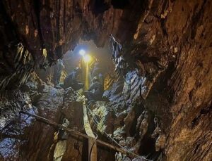 Rescuers search for alternative route to reach two missing in flooded Laos cave