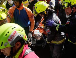 Venezuelan security guard pulled alive from basement eight days after twin quakes
