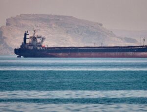 Ship hit in Hormuz as Iran’s top negotiator says strait to stay shut