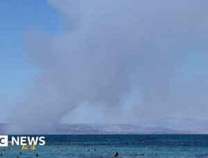 Two dead and evacuation under way as fires break out on Greek island